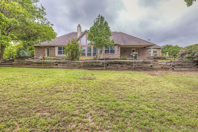 4157 New Prue Rd, Sand Springs, OK 74063 - back of house with a chimney, brick siding, and roof with shingles