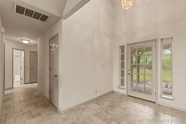 4157 New Prue Rd, Sand Springs, OK 74063 - foyer with stone finish floors and baseboards