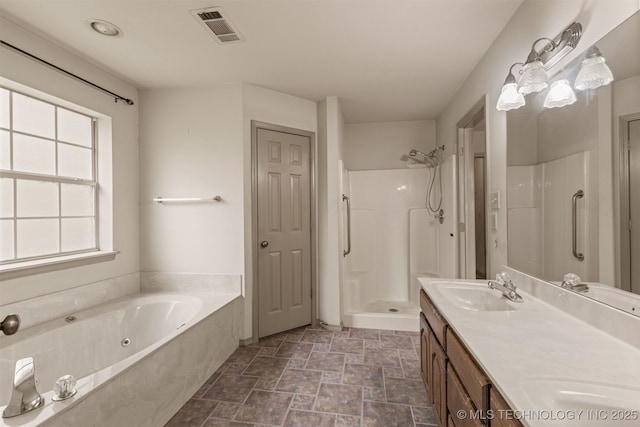 4157 New Prue Rd, Sand Springs, OK 74063 - full bath with a stall shower, stone finish flooring, a jetted tub, and double vanity