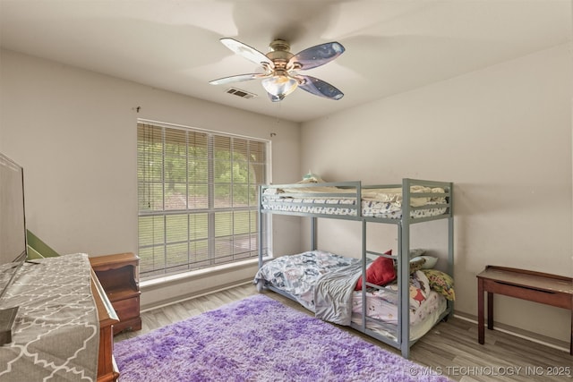 4157 New Prue Rd, Sand Springs, OK 74063 - bedroom featuring wood finished floors, a ceiling fan, and baseboards