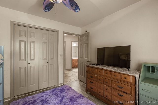 4157 New Prue Rd, Sand Springs, OK 74063 - bedroom with a closet, a ceiling fan, and wood finished floors