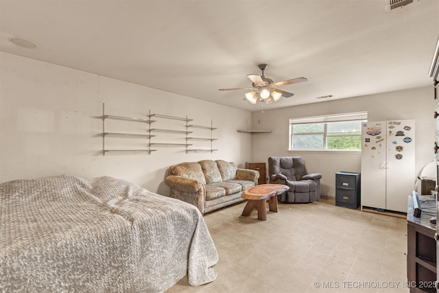 4157 New Prue Rd, Sand Springs, OK 74063 - bedroom with ceiling fan and freestanding refrigerator