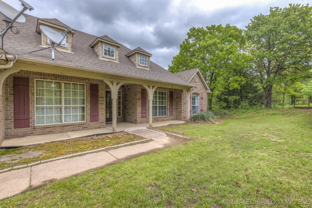 4157 New Prue Rd, Sand Springs, OK 74063 - view of front facade featuring brick siding, a front yard, roof with shingles, and a porch