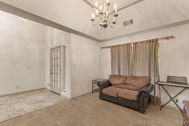 4157 New Prue Rd, Sand Springs, OK 74063 - living area featuring a chandelier, a high ceiling, and baseboards