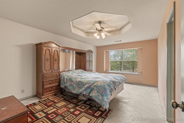 4157 New Prue Rd, Sand Springs, OK 74063 - bedroom featuring light carpet, baseboards, a ceiling fan, and a tray ceiling