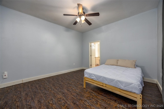 1020 N 3rd, Durant, OK 74701 - bedroom with baseboards, wood finished floors, and a ceiling fan