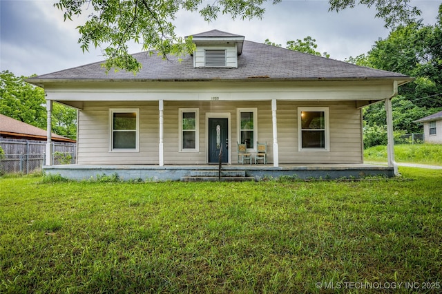 1020 N 3rd, Durant, OK 74701 - view of front of house with covered porch and a shingled roof