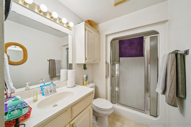 32410 W 301st St S, Bristow, OK 74010 - bathroom featuring a shower stall, vanity, and toilet