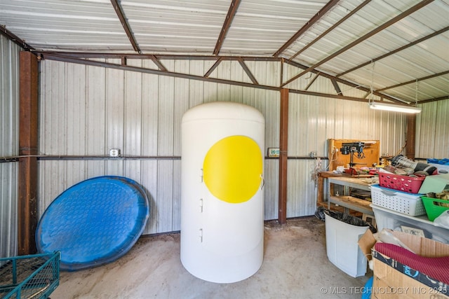 32410 W 301st St S, Bristow, OK 74010 - garage with metal wall, a workshop area, and gas water heater