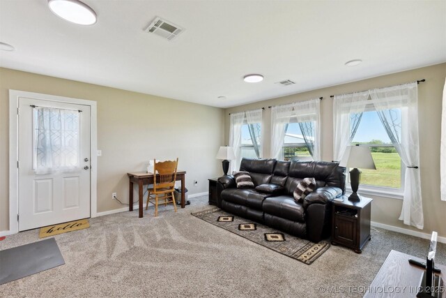 780452 S 3530, Cushing, OK 74023 - carpeted living room featuring baseboards