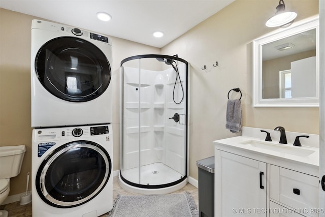 780452 S 3530, Cushing, OK 74023 - bathroom with stacked washer and clothes dryer, a shower stall, toilet, and vanity