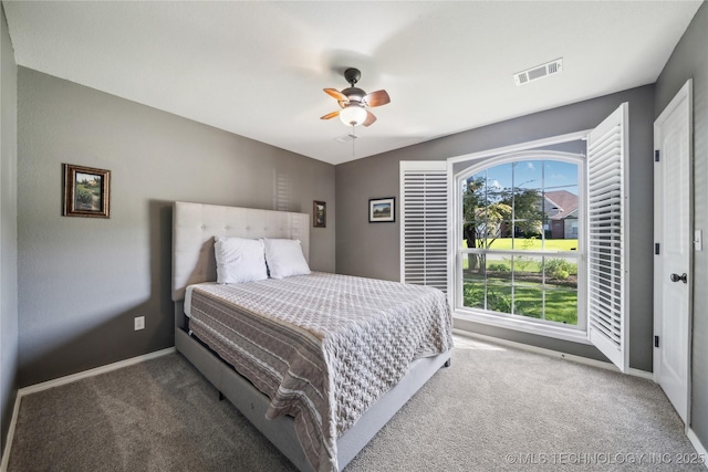 26233 E 114th Pl, Coweta, OK 74429 - carpeted bedroom with baseboards and a ceiling fan