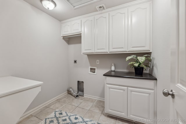 370463 E 5750th Rd, Terlton, OK 74081 - washroom featuring electric dryer hookup, cabinet space, hookup for a washing machine, baseboards, and light tile patterned floors