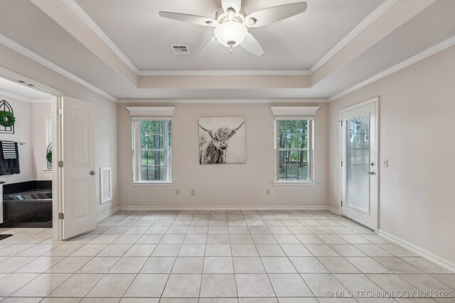 370463 E 5750th Rd, Terlton, OK 74081 - spare room with a raised ceiling, ceiling fan, light tile patterned flooring, and ornamental molding