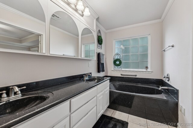 370463 E 5750th Rd, Terlton, OK 74081 - bathroom featuring a bath, double vanity, ornamental molding, and tile patterned flooring