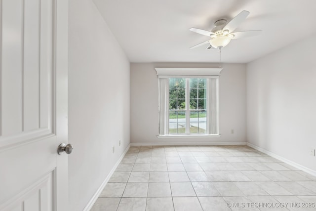 370463 E 5750th Rd, Terlton, OK 74081 - spare room with a ceiling fan, baseboards, and light tile patterned floors