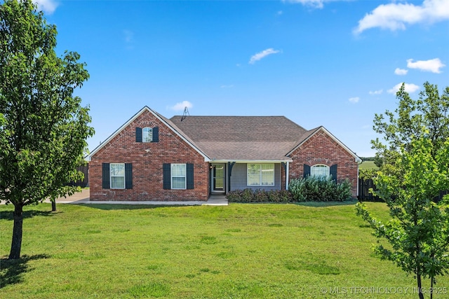 28744 N 3964th Rd, Ochelata, OK 74051 - view of front of house featuring brick siding, a front yard, and a shingled roof