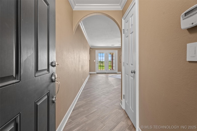 28744 N 3964th Rd, Ochelata, OK 74051 - entryway featuring ornamental molding, baseboards, arched walkways, and light wood-style floors