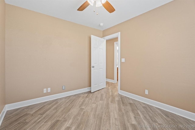 28744 N 3964th Rd, Ochelata, OK 74051 - empty room with ceiling fan, light wood-style flooring, baseboards, and a smoke detector