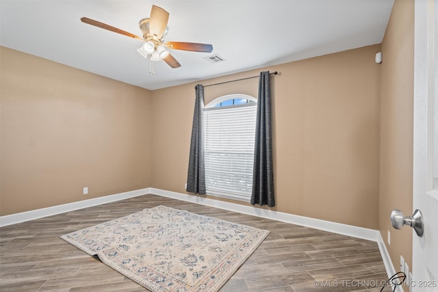 28744 N 3964th Rd, Ochelata, OK 74051 - empty room with baseboards, ceiling fan, and wood finished floors