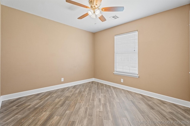 28744 N 3964th Rd, Ochelata, OK 74051 - empty room featuring ceiling fan, wood finished floors, and baseboards