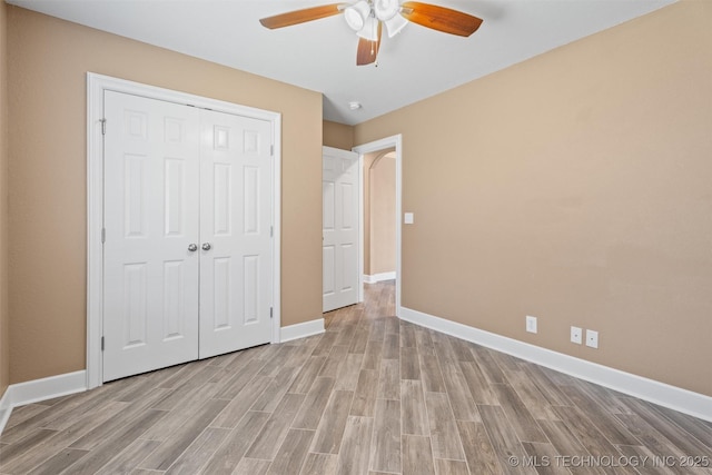 28744 N 3964th Rd, Ochelata, OK 74051 - unfurnished bedroom featuring light wood finished floors, a closet, and baseboards