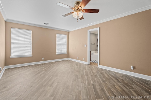 28744 N 3964th Rd, Ochelata, OK 74051 - unfurnished room featuring crown molding, a ceiling fan, wood finished floors, and baseboards