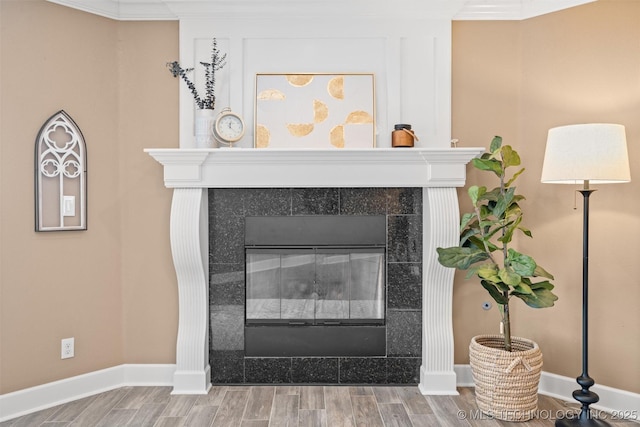 28744 N 3964th Rd, Ochelata, OK 74051 - detailed view of a tile fireplace, baseboards, and wood finished floors