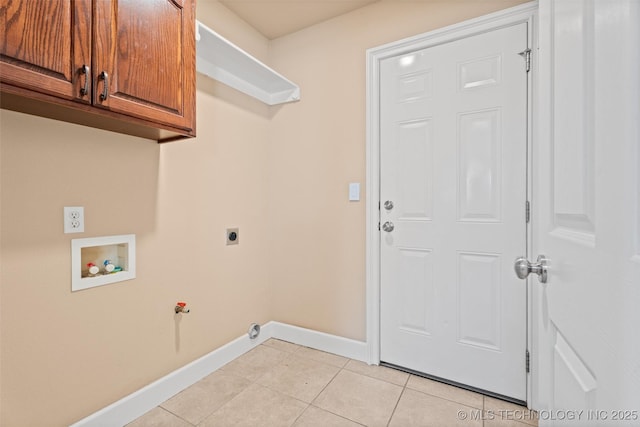 28744 N 3964th Rd, Ochelata, OK 74051 - laundry room with hookup for a washing machine, baseboards, cabinet space, light tile patterned flooring, and electric dryer hookup