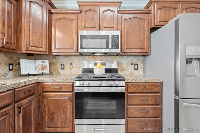 28744 N 3964th Rd, Ochelata, OK 74051 - kitchen featuring stainless steel appliances, decorative backsplash, and light countertops