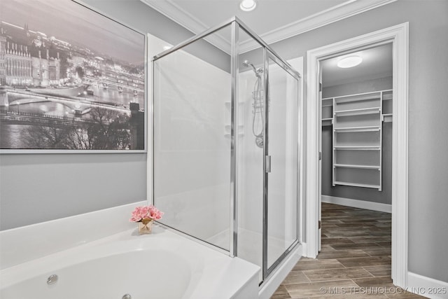28744 N 3964th Rd, Ochelata, OK 74051 - full bath featuring a stall shower, crown molding, a spacious closet, a tub with jets, and wood finished floors