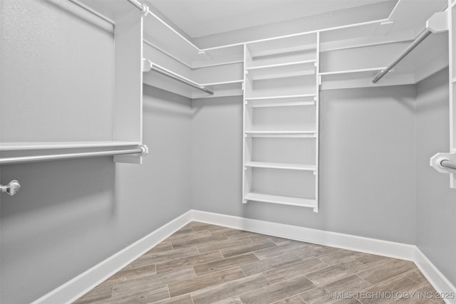 28744 N 3964th Rd, Ochelata, OK 74051 - spacious closet featuring wood finished floors