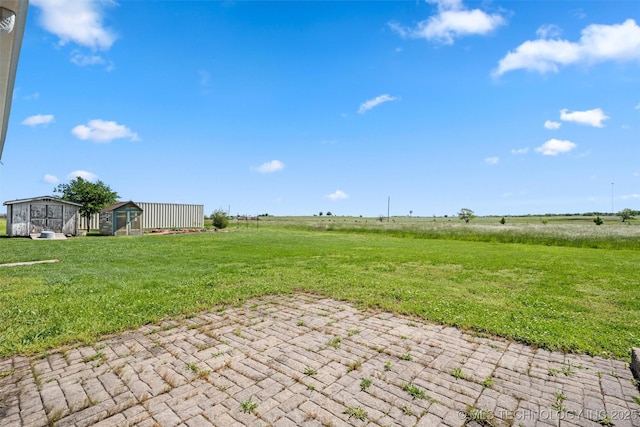 28744 N 3964th Rd, Ochelata, OK 74051 - view of patio featuring an outdoor structure and a view of countryside