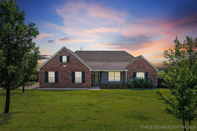 28744 N 3964th Rd, Ochelata, OK 74051 - traditional-style home with brick siding, a front yard, and roof with shingles