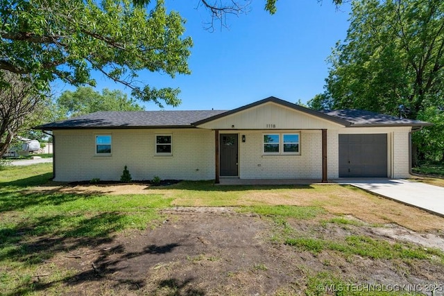 1118 E 131st St S, Jenks, OK 74037 - ranch-style house featuring a garage, brick siding, concrete driveway, and a front lawn