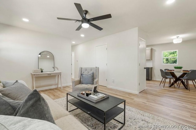 1118 E 131st St S, Jenks, OK 74037 - living area with light wood-type flooring, ceiling fan, recessed lighting, and baseboards