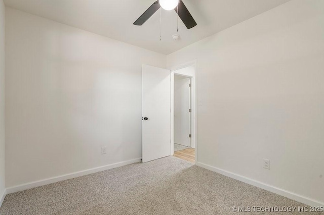 1118 E 131st St S, Jenks, OK 74037 - carpeted empty room with a ceiling fan, baseboards, and a smoke detector