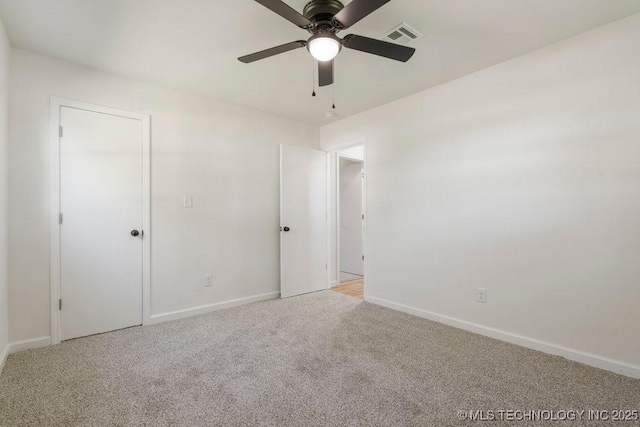 1118 E 131st St S, Jenks, OK 74037 - unfurnished bedroom featuring light carpet, baseboards, and ceiling fan
