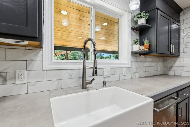 2982 S 294th E Ave, Broken Arrow, OK 74014 - kitchen with open shelves, a sink, backsplash, light countertops, and stainless steel dishwasher