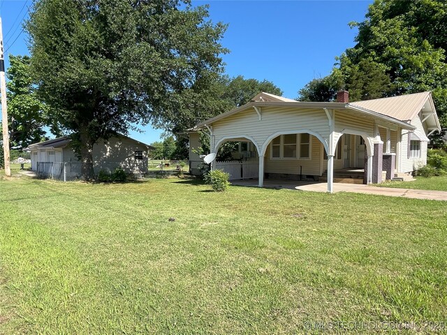 701 NW 3rd St, Stigler, OK 74462 - view of yard featuring a patio