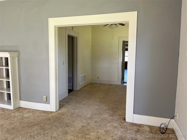 701 NW 3rd St, Stigler, OK 74462 - carpeted empty room with baseboards