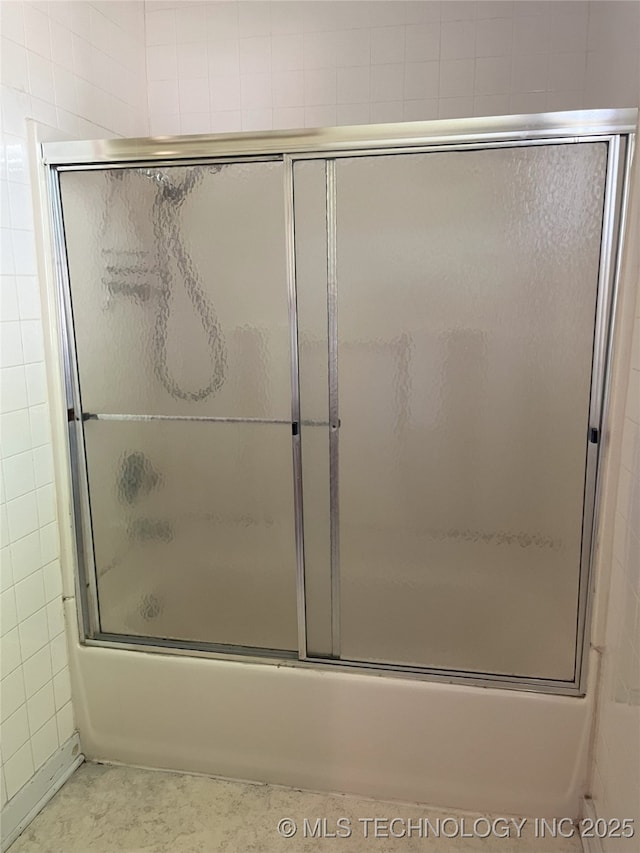 701 NW 3rd St, Stigler, OK 74462 - full bathroom with combined bath / shower with glass door