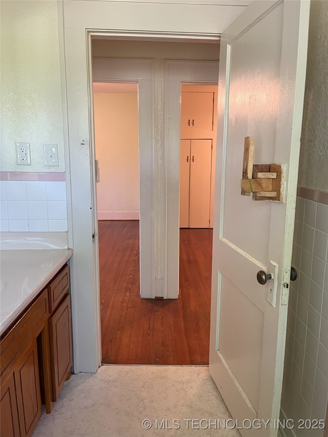701 NW 3rd St, Stigler, OK 74462 - hall featuring light wood-type flooring