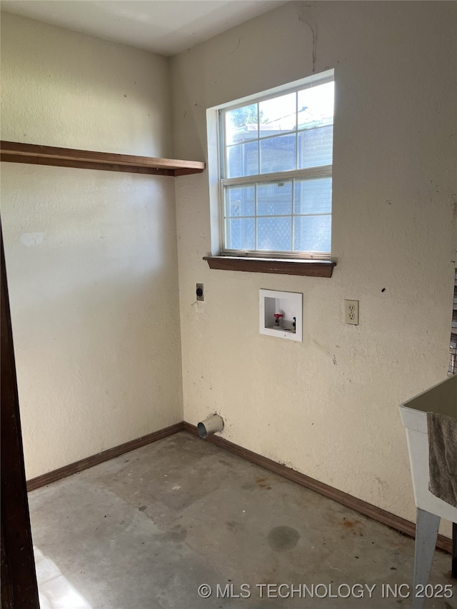 701 NW 3rd St, Stigler, OK 74462 - washroom with hookup for a washing machine, baseboards, and hookup for an electric dryer