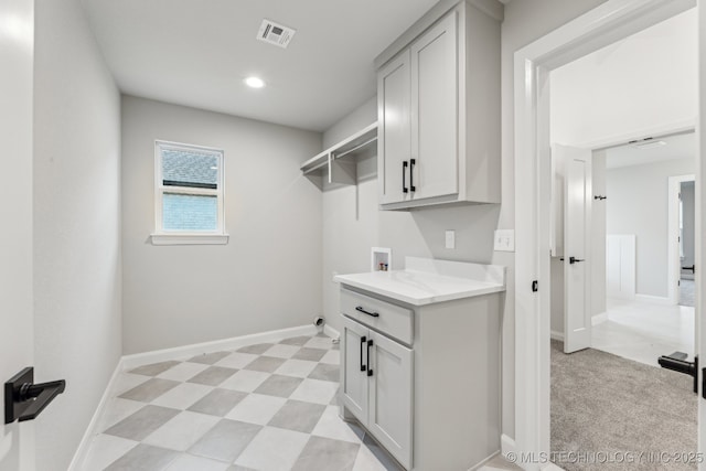 23250 E 106th Pl S, Broken Arrow, OK 74014 - laundry area featuring washer hookup, cabinet space, baseboards, and recessed lighting