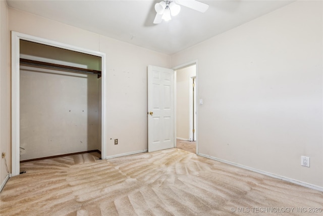 8805 E 46th Pl, Tulsa, OK 74145 - unfurnished bedroom with carpet flooring, baseboards, a closet, and ceiling fan