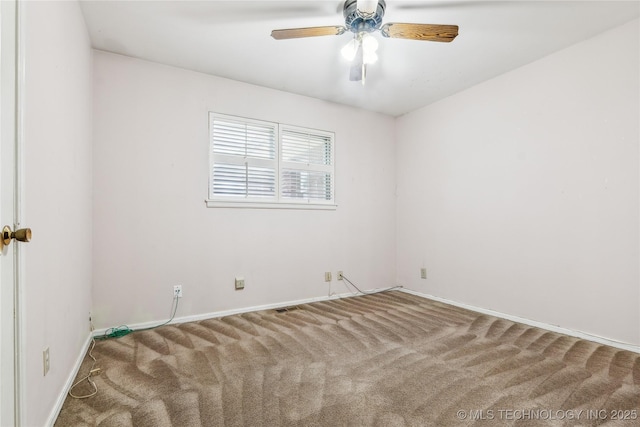 8805 E 46th Pl, Tulsa, OK 74145 - carpeted spare room featuring a ceiling fan and baseboards
