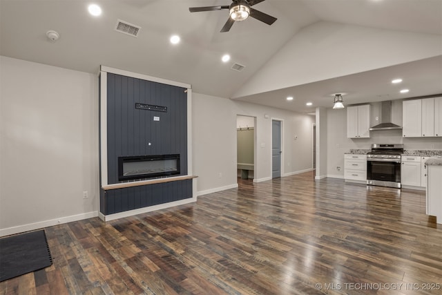 110 S Birch St, Sapulpa, OK 74066 - unfurnished living room with a ceiling fan, recessed lighting, dark wood-type flooring, high vaulted ceiling, and a large fireplace