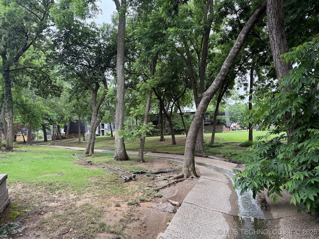 4428 E 68th St Unit 484, Tulsa, OK 74136 - view of community with a lawn