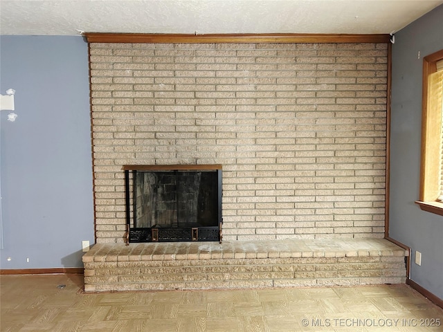 303 W Mckinley Ave, Sapulpa, OK 74066 - detailed view of a brick fireplace and baseboards